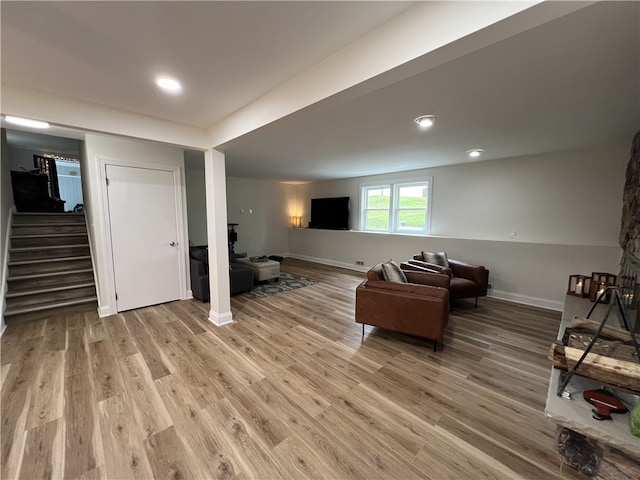 384 Grove Rd, Jefferson Twp Mer, PA 16137 - living area featuring stairs, baseboards, and light wood-style floors