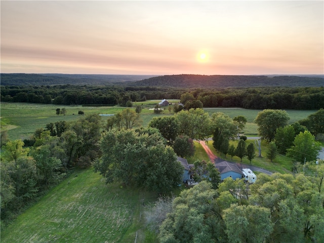 aerial view at dusk with a rural view