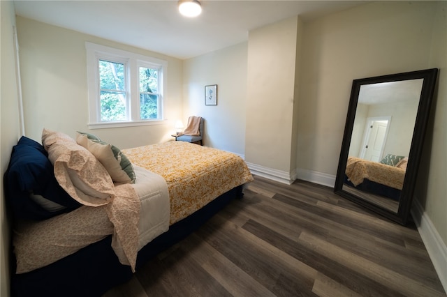 bedroom featuring dark hardwood / wood-style floors