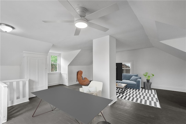 bonus room featuring lofted ceiling, ceiling fan, and dark wood-type flooring