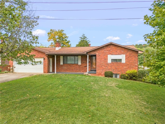 single story home with a front yard and a garage