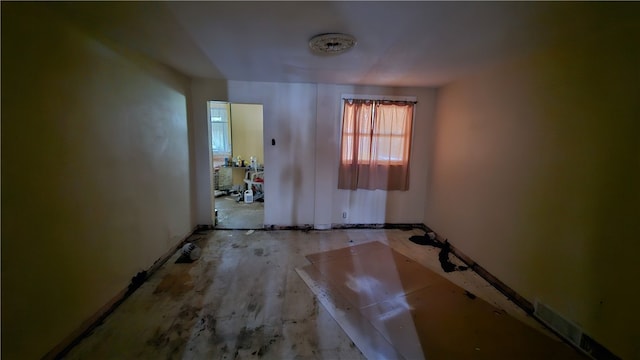 spare room featuring light hardwood / wood-style flooring