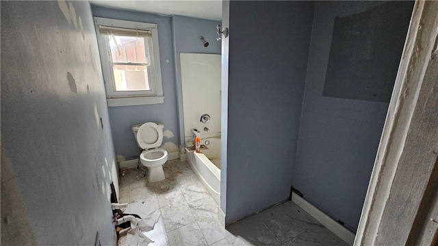 bathroom with toilet and shower / bath combination