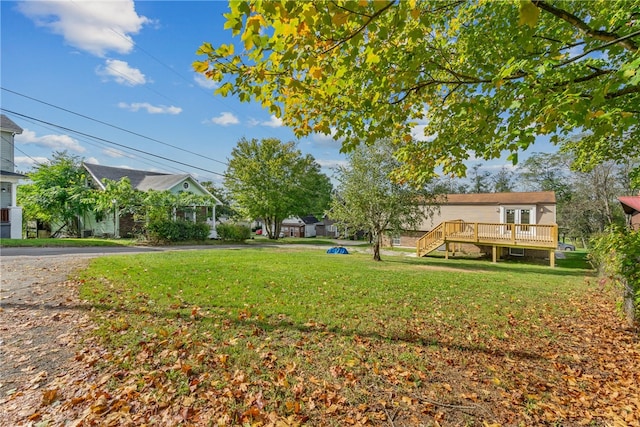 view of yard featuring a deck