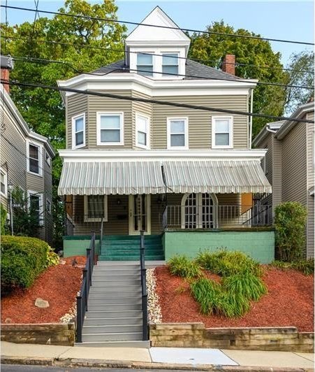 view of front of home featuring covered porch