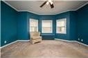 unfurnished bedroom with carpet floors and crown molding