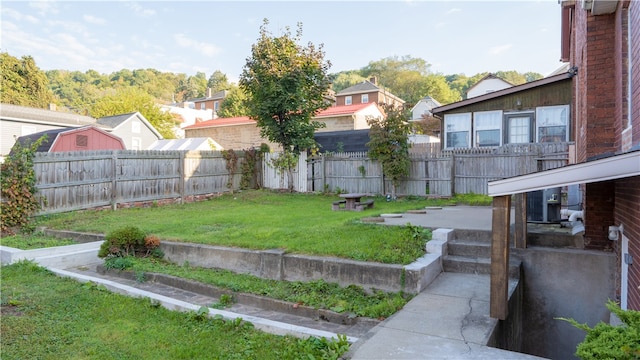 view of yard with central AC