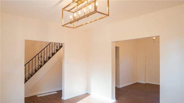 stairway featuring hardwood / wood-style flooring