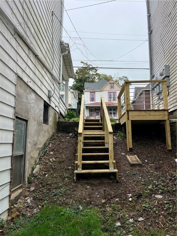 view of yard featuring a wooden deck