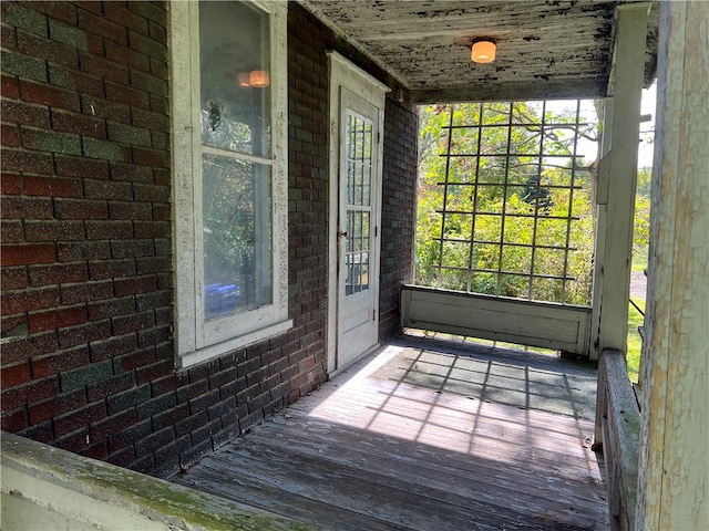 unfurnished sunroom with plenty of natural light