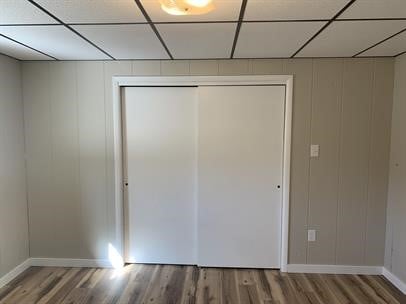 interior space featuring hardwood / wood-style flooring and a closet