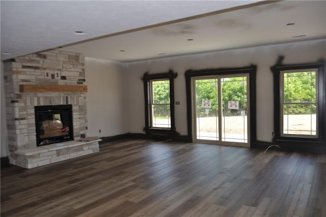 207 Falcon Ln, Cranberry Twp, PA 16066 - unfurnished living room with a fireplace and dark wood-type flooring