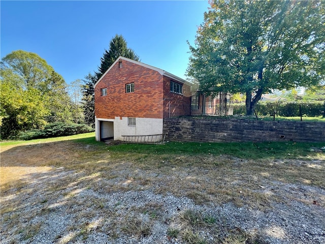 view of side of property featuring a garage