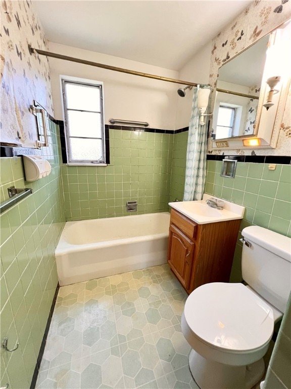 full bathroom featuring shower / bath combo, vanity, toilet, and tile patterned floors