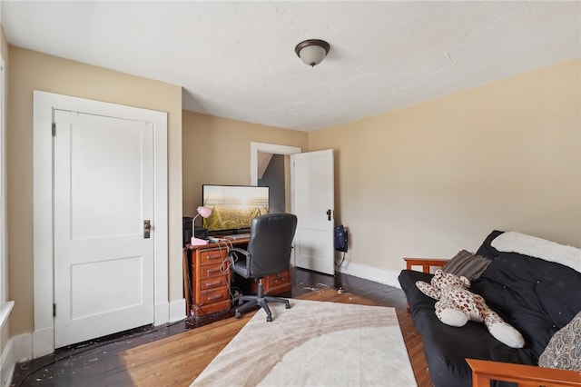 home office featuring dark wood-type flooring