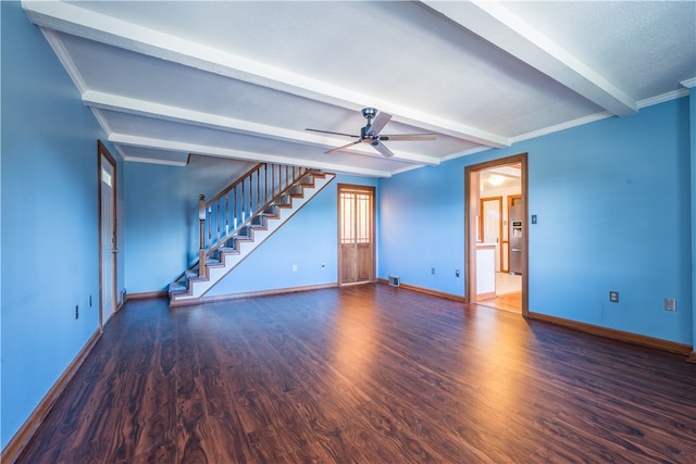 spare room with beam ceiling, ceiling fan, dark wood-type flooring, and ornamental molding