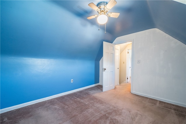 bonus room featuring carpet flooring, ceiling fan, and vaulted ceiling