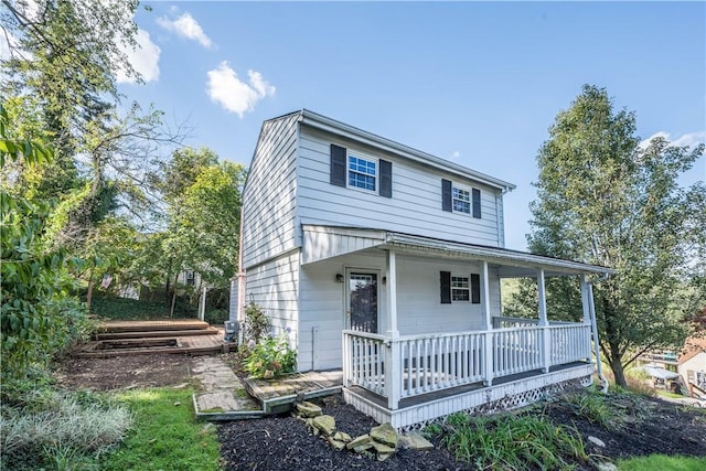 view of front of property featuring covered porch