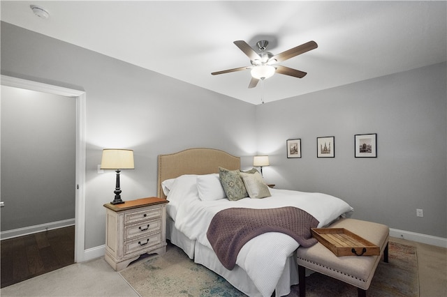 bedroom featuring ceiling fan and light hardwood / wood-style floors