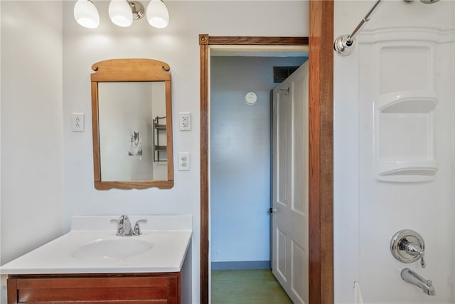 bathroom featuring vanity and shower / bathing tub combination