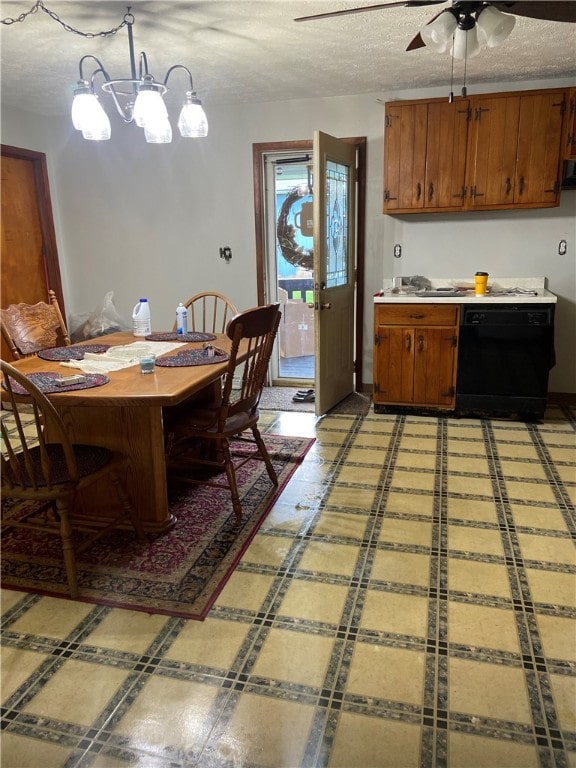 kitchen with dishwasher, ceiling fan with notable chandelier, and a textured ceiling