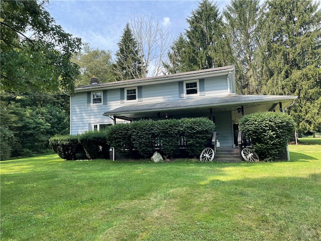 view of front of home featuring a front yard