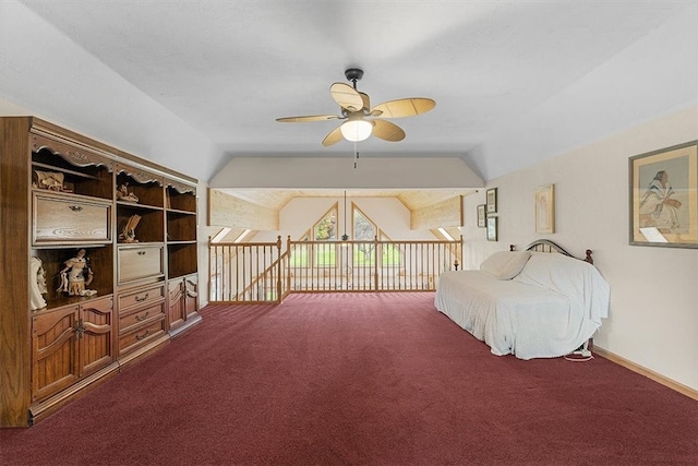 carpeted bedroom featuring ceiling fan and lofted ceiling