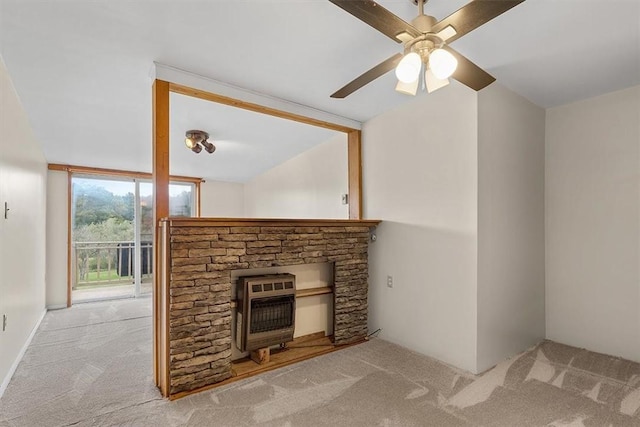 unfurnished living room with ceiling fan and light carpet