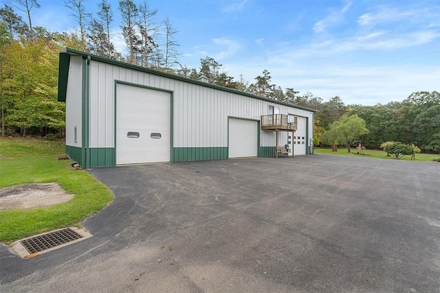 view of outbuilding with a garage