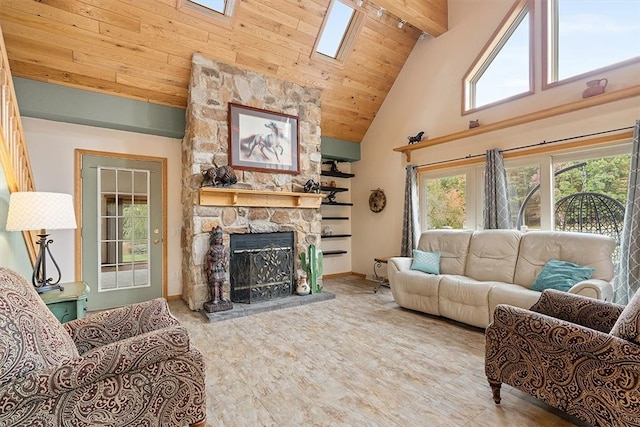 living room with hardwood / wood-style floors, high vaulted ceiling, a stone fireplace, a skylight, and beam ceiling