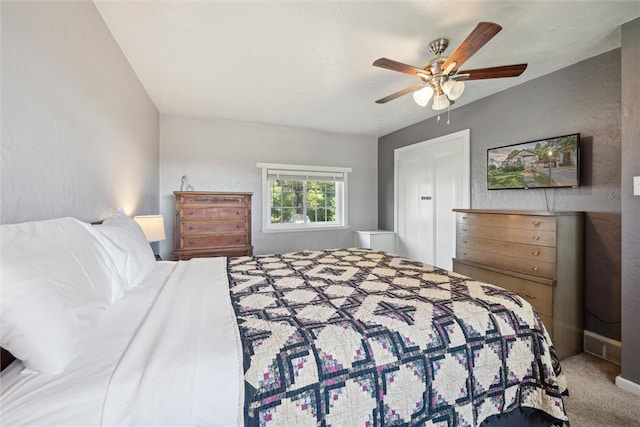 carpeted bedroom with ceiling fan