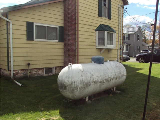 view of home's exterior featuring a lawn