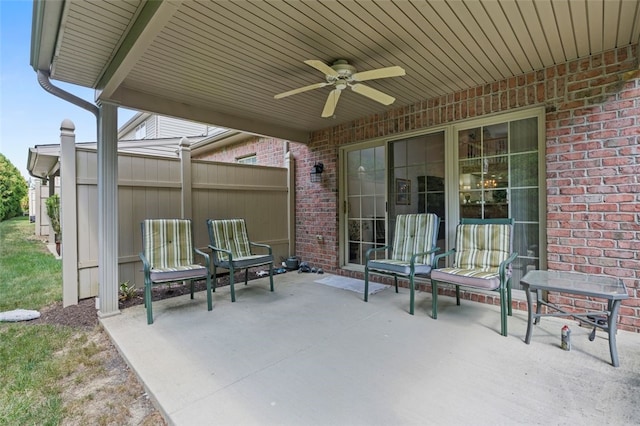 view of patio featuring ceiling fan