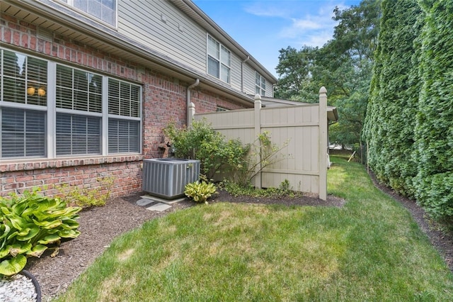 view of yard featuring central AC unit