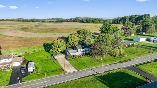 birds eye view of property featuring a rural view