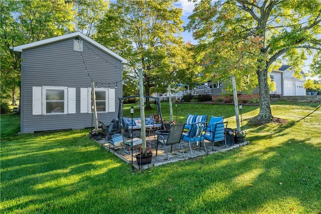 exterior space with a yard and a patio area