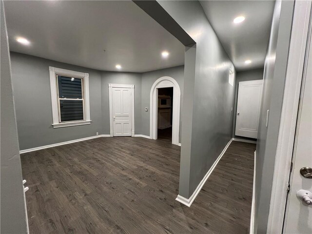 interior space with dark hardwood / wood-style flooring