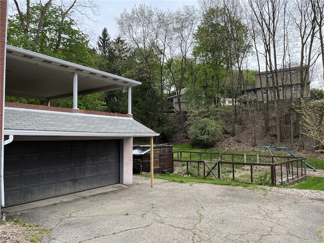 garage with a carport