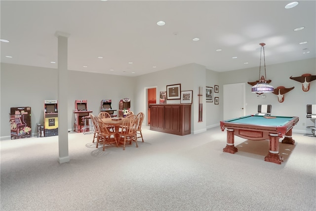 recreation room with pool table and light colored carpet