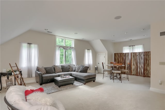 living room with light carpet and lofted ceiling