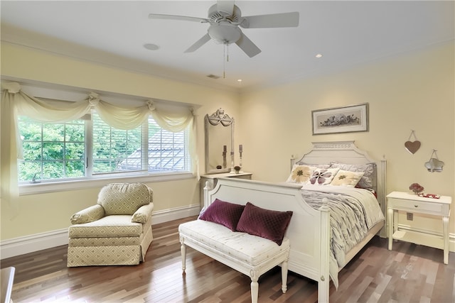 bedroom with hardwood / wood-style flooring and ceiling fan