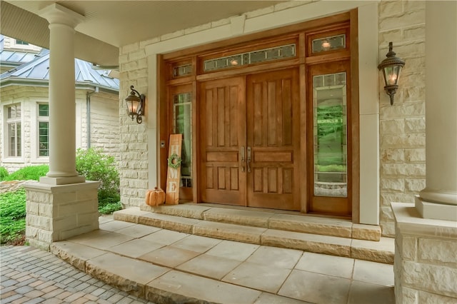 entrance to property with a porch