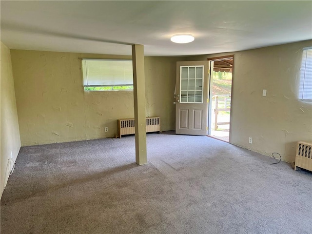 1611 Crawford Rd, North Fayette, PA 15126 - carpeted spare room featuring radiator and healthy amount of natural light