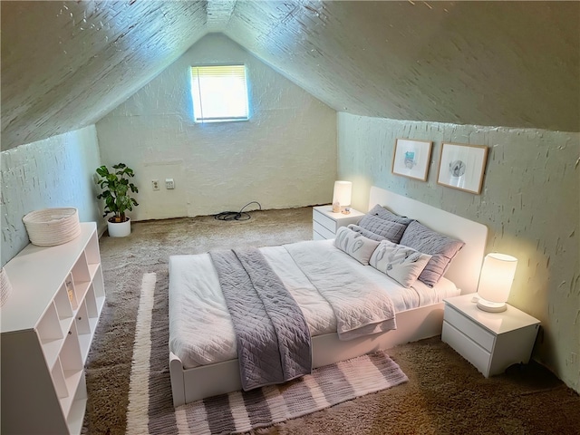 bedroom featuring vaulted ceiling and carpet floors