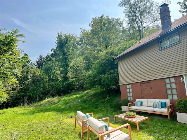 view of yard with an outdoor living space