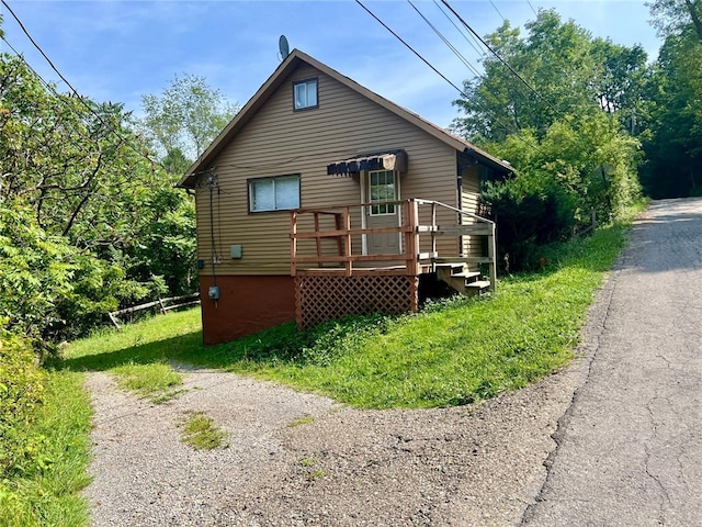 1611 Crawford Rd, North Fayette, PA 15126 - back of property with a deck