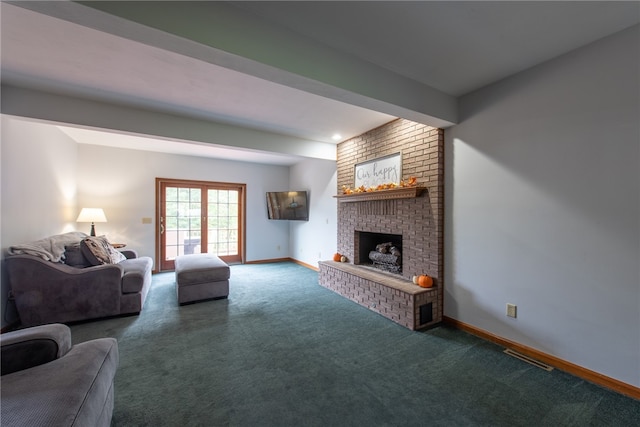 living room featuring carpet floors and a brick fireplace