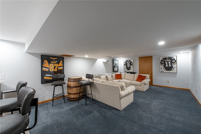 living room featuring dark colored carpet