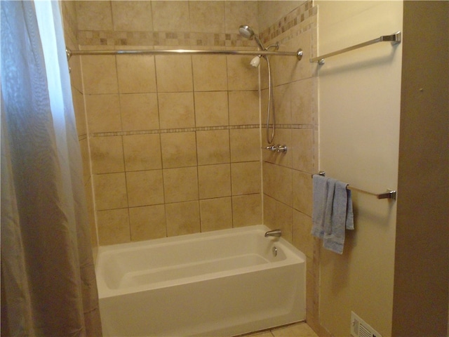 bathroom featuring shower / bath combination with curtain