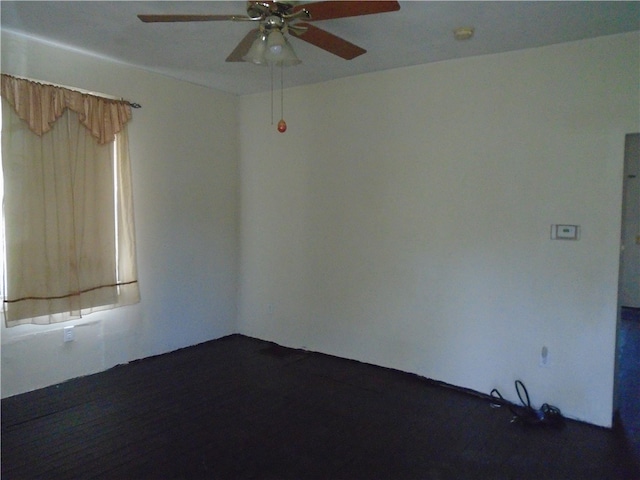 spare room featuring ceiling fan